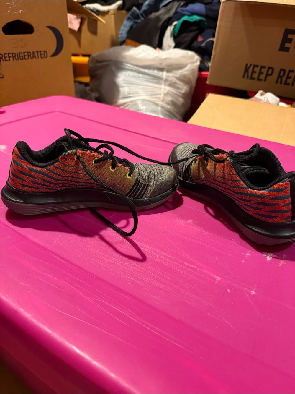 Under Armour Kids' Black and Gray Sneakers with Orange Accent